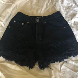 High waisted ripped up shorts